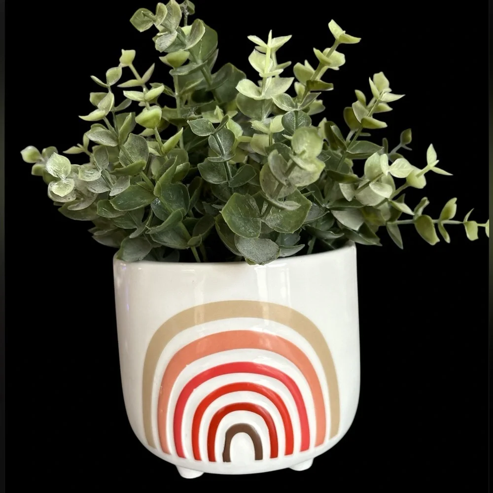 Faux plant in ceramic pot